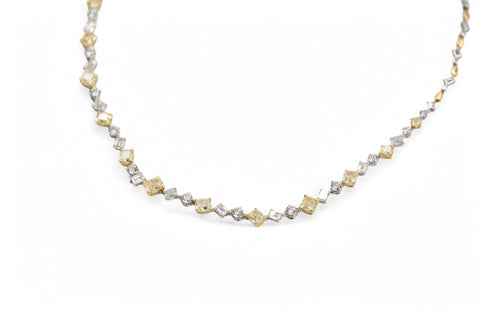 Yellow and white gold necklace with fancy yellow diamond