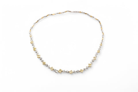 Yellow and white gold necklace with fancy yellow diamond