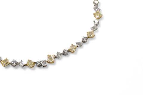 Yellow and white gold necklace with fancy yellow diamond