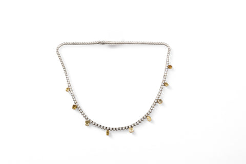 Yellow and white gold necklace with fancy yellow diamond