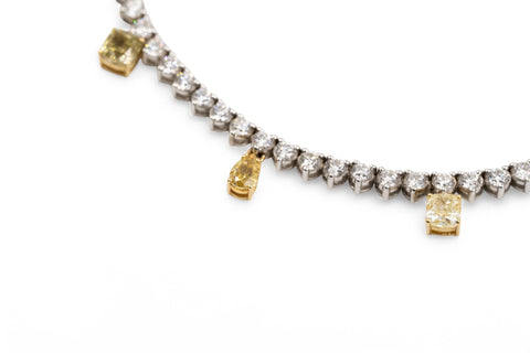 Yellow and white gold necklace with fancy yellow diamond