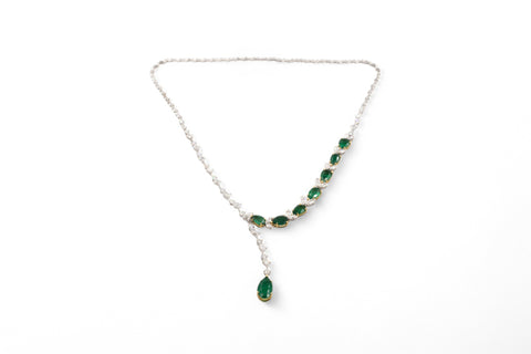 White gold necklace with emerald and diamond