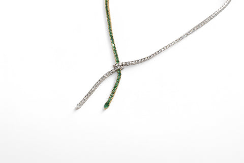 White gold necklace with emerald and diamond
