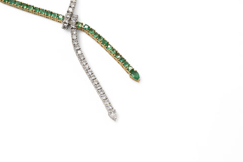 White gold necklace with emerald and diamond