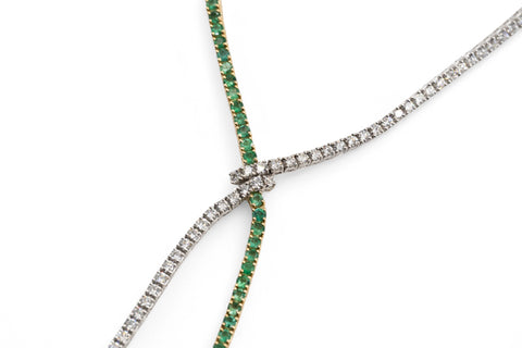 White gold necklace with emerald and diamond