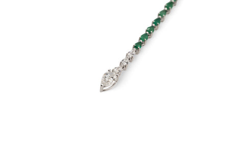 White gold necklace with emerald and diamond