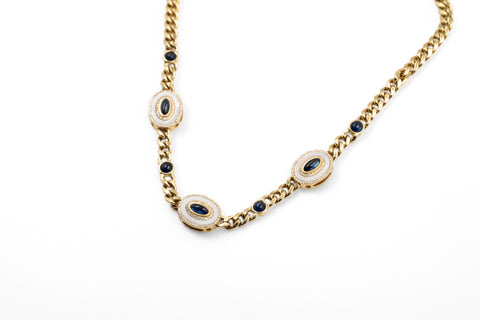 18 Kt yellow gold necklace with diamonds and blue sapphire