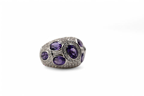 18 Kt gold ring with diamond and amethyst